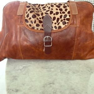 Duffel bag oh smell the leather